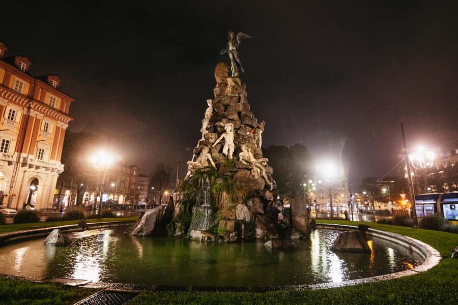 Turin: Magic Guided Tour - A private bus with an Italian group