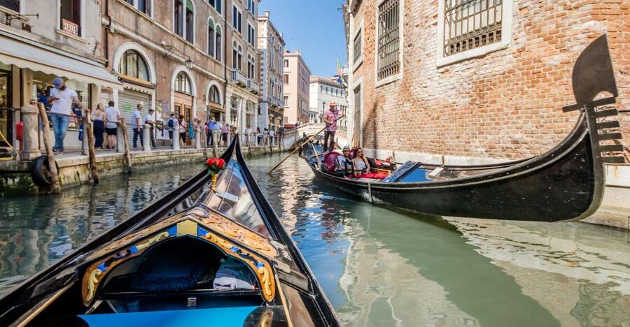 Venice: Shared Gondola Ride Across the Grand Canal - The gondolier, commentary, and atmosphere