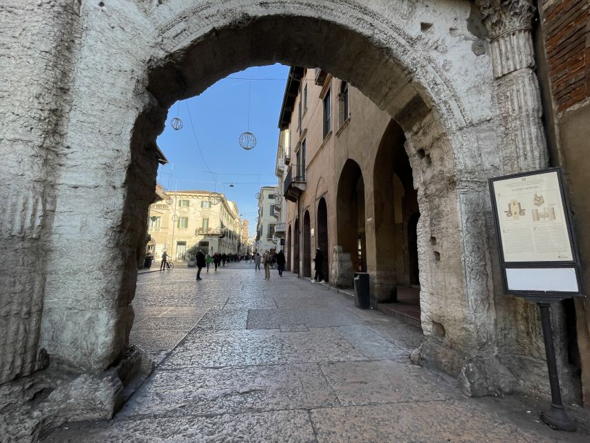 Verona: Small Group Guided Walking Tour with Arena Tickets - Piazza delle Erbe and the everyday side of Verona