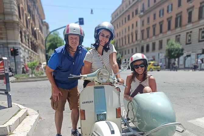 Vespa Sidecar Tour By Night with Pickup - Piazza Venezia sets the Roman stage