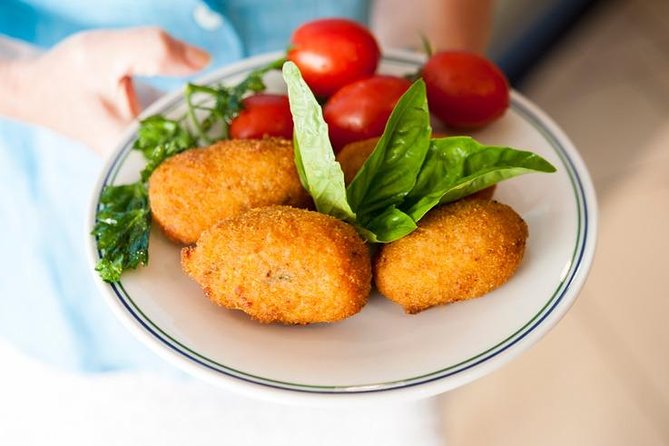 Walking Food Tour in Sorrento w/ Limoncello Factory Lemon Grove - Sfogliatelle, panini, and fried rice balls